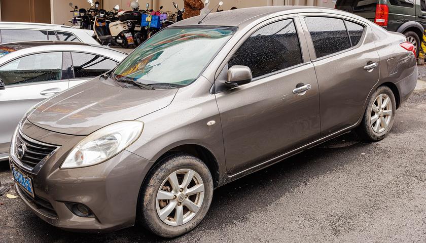 Economy rental car — Nissan Sunny